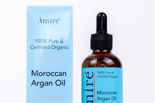 100 percent pure and organic moroccan argan oil for hair, skin, and nails with blue packaging-cut off